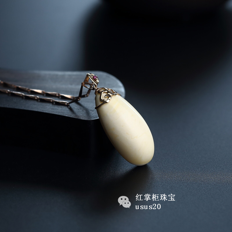 蜜蠟克價大概是多少_白蜜蠟價格多少錢一克_蜜蠟錢袋子吊墜圖片